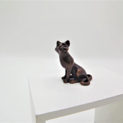 Miniature Sitting Cat